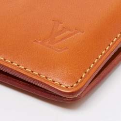 Pre Owned Louis Vuitton Orange Nomade Leather Marco Wallet