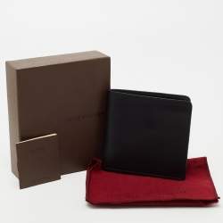 Pre Owned محفظة ثنائية الطي لوي فيتون جلد أسود بشعار ماركة مثقب