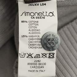 Pre Owned ```json
[{"name": "Roberto Cavalli Tri Color Rib Knit Cardigan M", "name_ar": "كارديجان محبوك مضلع بثلاثة ألوان روبيرتو كافالي مقاس متوسط"}]
```