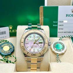 Pre Owned Rolex Yacht Master 16623 Automatic Black Mother of Pearl 18K Yellow Gold Stainless Steel Men's Wristwatch 40 mm