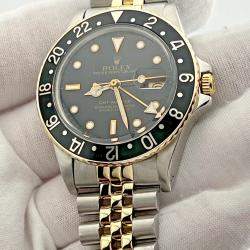 Pre Owned Rolex GMT Master 16753 Automatic Black & Yellow 18K Yellow Gold Stainless Steel Men's Wristwatch 40 mm