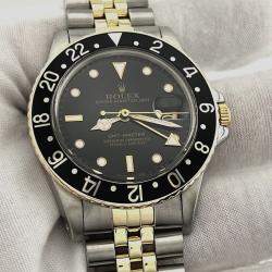 Pre Owned Rolex GMT Master 16753 Automatic Black & Yellow 18K Yellow Gold Stainless Steel Men's Wristwatch 40 mm