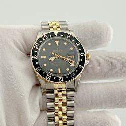 Pre Owned Rolex GMT Master 16753 Automatic Black & Yellow 18K Yellow Gold Stainless Steel Men's Wristwatch 40 mm