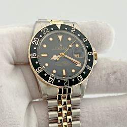 Pre Owned Rolex GMT Master 16753 Automatic Black & Yellow 18K Yellow Gold Stainless Steel Men's Wristwatch 40 mm