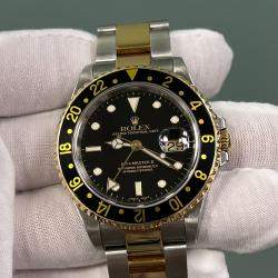 Pre Owned Rolex GMT Master II 16713 Automatic Black 18K Yellow Gold Stainless Steel Men's Wristwatch 40 mm