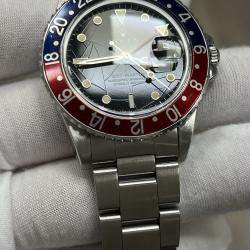Pre Owned Rolex GMT Master 16750 Automatic Black Spider Dial Stainless Steel Men's Wristwatch 40 mm