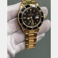 Pre Owned Rolex Submariner 16808 Automatic Black 18k Yellow Gold Men's Wristwatch 40 mm