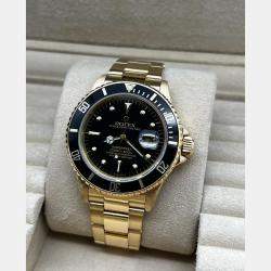 Pre Owned Rolex Submariner 16808 Automatic Black 18k Yellow Gold Men's Wristwatch 40 mm