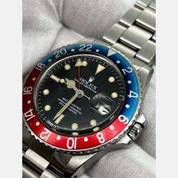 Pre Owned Rolex GMT Master 16750 Automatic Black Spider Dial Stainless Steel Men's Wristwatch 40 mm