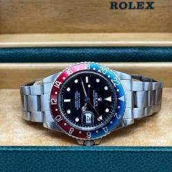 Pre Owned Rolex GMT Master 16750 Automatic Black Spider Dial Stainless Steel Men's Wristwatch 40 mm
