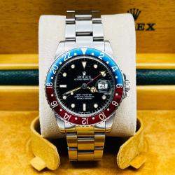 Pre Owned Rolex GMT Master 16750 Automatic Black Spider Dial Stainless Steel Men's Wristwatch 40 mm