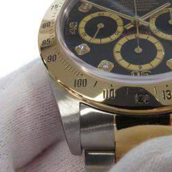 مملوكة مسبقًا Rolex Black 18K Yellow Gold And Stainless Steel Cosmograph Daytona 16523G Automatic Men's Wristwatch 40 mm