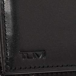 Pre Owned Tumi Black Leather Global Vertical Flip Coin Wallet