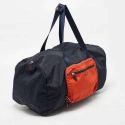 Pre Owned TUMI Navy Blue/Orange Nylon Foldable Compact Duffle Bag