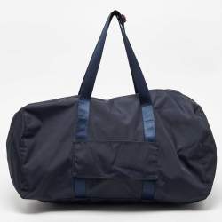 Pre Owned TUMI Navy Blue/Orange Nylon Foldable Compact Duffle Bag