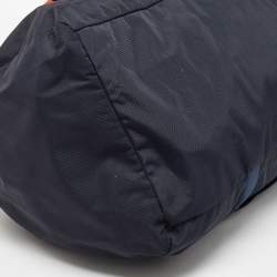 Pre Owned TUMI Navy Blue/Orange Nylon Foldable Compact Duffle Bag