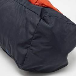 Pre Owned TUMI Navy Blue/Orange Nylon Foldable Compact Duffle Bag