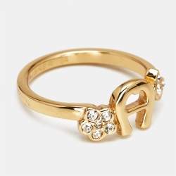 Pre Owned Aigner Logo Crystals Gold Tone Ring Size 53