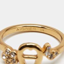 Pre Owned Aigner Logo Crystals Gold Tone Ring Size 53
