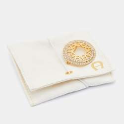 Pre Owned Aigner Gold Tone Crystal Embellished Logo Round Brooch