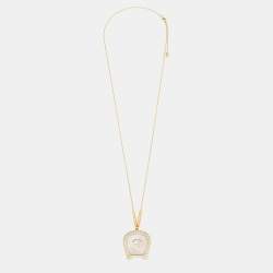 Pre Owned Aigner Gold Tone Crystal Mother of Pearl A Logo Pendant Necklace