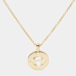 Pre Owned Aigner Gold Tone Mother of Pearl Crystal Logo Earring & Necklace Set