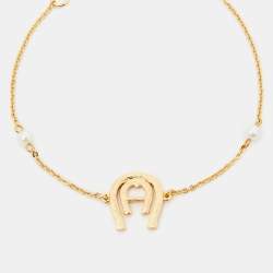 Pre Owned Aigner Crystal Faux Pearl Gold Tone Bracelet