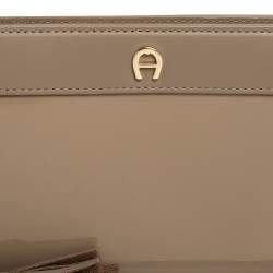 Pre Owned Aigner Taupe Leather and Patent Leather Cavallina Tassel Zip Around Wallet