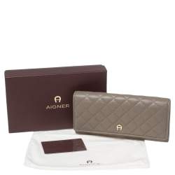 Pre Owned Aigner Beige Quilted Leather Flap Continental Wallet