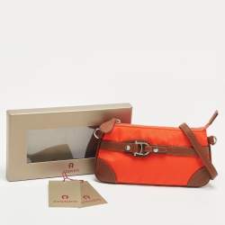 Pre Owned Aigner Orange/Tan Nylon and Leather Buckle Baguette Bag
