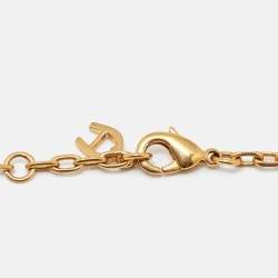 Aigner Gold Tone Crystal Logo Flower Pendant Necklace