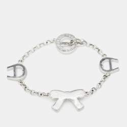 Pre Owned Aigner Logo Bow Crystals Silver Tone Bracelet