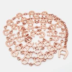 مملوكة مسبقًا حزام أيغنر معدني بلون وردي مع شعار