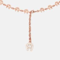 مملوكة مسبقًا حزام أيغنر معدني بلون وردي مع شعار