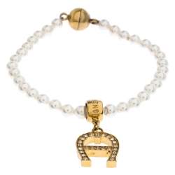 Pre Owned Aigner Faux Pearl Crystal Logo Pendant Magnetic Bracelet