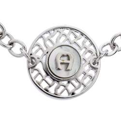 Pre Owned Aigner Silver Tone Mother of Pearl Logo Bracelet