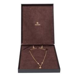 Pre Owned Aigner Crystal Logo Gold Tone Necklace and Earrings Set