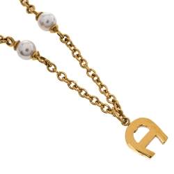 Pre Owned Aigner Crystal Logo Gold Tone Necklace and Earrings Set