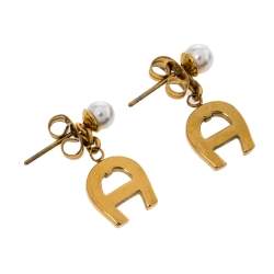 Pre Owned Aigner Crystal Logo Gold Tone Necklace and Earrings Set