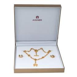 Pre Owned Aigner Logo Crystal Gold Tone Earring Necklace Set