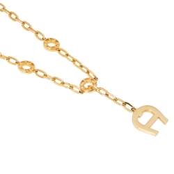 Pre Owned Aigner Logo Crystal Gold Tone Earring Necklace Set