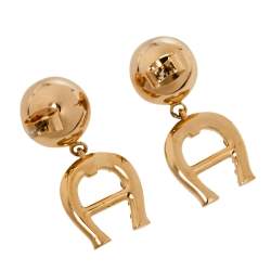 Aigner Gold Tone Layered Bracelet and Logo Drop Earrings Set