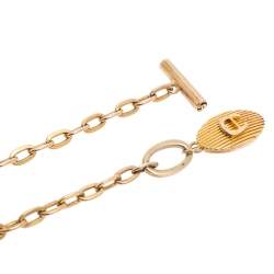 Pre Owned Aigner Gold Tone Logo Pendant Toggle Necklace