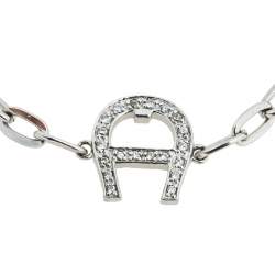 Pre Owned Aigner Silver Tone Crystal Logo Toggle Bracelet