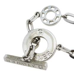 Pre Owned Aigner Silver Tone Crystal Logo Toggle Bracelet
