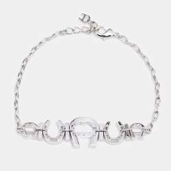 Pre Owned Aigner Silver Tone Crystal Logo & Horseshoe Bracelet