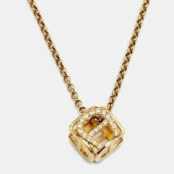Pre Owned Aigner Gold Tone Crystal Cube Pendant Necklace