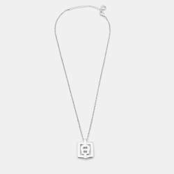 Aigner Silver Tone Square Crystal Logo Pendant Necklace