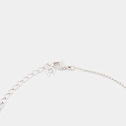 Aigner Silver Tone Crystal Logo Hollow Ball Pendant Necklace