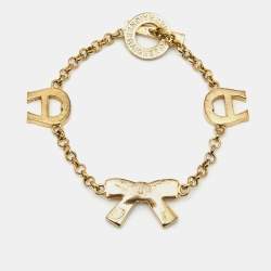 Pre Owned Aigner Bow Crystals Gold Tone Bracelet